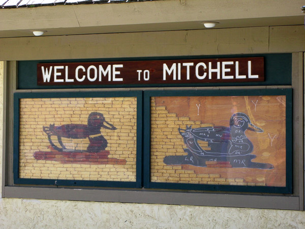 Left panel is completed mural and right shows how it is assembled.