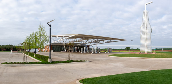 Ops gas station and cafe with 400 different varieties of soda pop with a soda pop bottel-shaped sign, Arcadia, OK