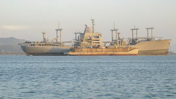 Sturgeon fishing on Suison Bay, mothball fleet
