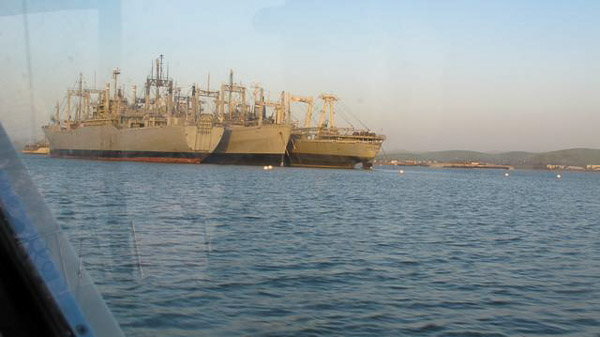 Sturgeon fishing on Suison Bay, mothball fleet
