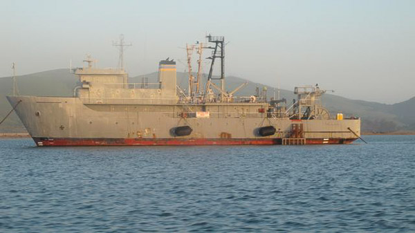 Sturgeon fishing on Suison Bay, mothball fleet
