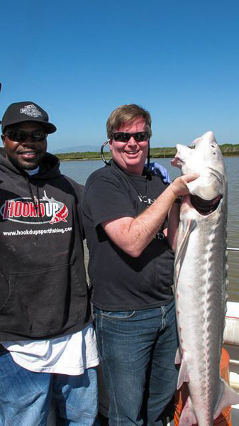 Sturgeon fishing on Suison Bay, a keeper