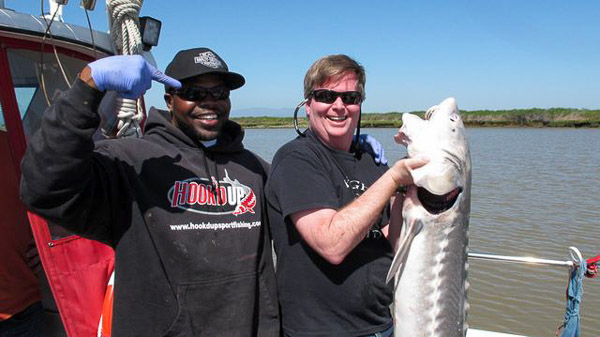 Sturgeon fishing on Suison Bay, a keeper