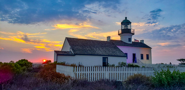 Cabrillo National Monument lighthouse lite in purple in gold to commorate the passing in the 19th amendment for women's right to vote